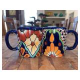 Set of (2) hand-painted Mexican Talavera coffee mugs - identified as a Garay Talavera pieces…..3-3/4” tall