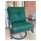 Black metal swivel rocker with nice thick green cushions…..all needs cleaned from dust and pollen…..29-1/2 x 18 x 20-1/2 to top of cushion (36 tall overall)