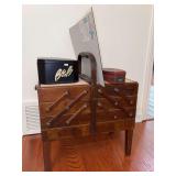 Assortment of sewing supplies and vintage sewing caddy