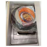 Contents of drawer below oven and side cabinet…..bakeware, large cookie sheets and more
