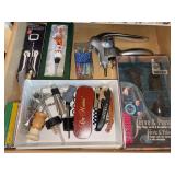 Contents of drawer by sink……grouping of corkscrews and stoppers