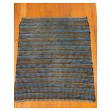 Hand-woven dark blue/multi-purpose rug…..30-3/4 x 36…..very lightweight