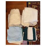 Grouping of king and queen size linens….flat sheets, fitted sheets and pillowcases