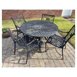 5-piece outdoor patio set - includes round table with umbrella slot and 4 arm chairs…..48-1/2”D x 29” tall - each chair is 22-1/4 x 19-1/2 x 17 tall to seat (35-1/4 tall overall)