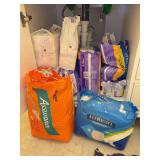 Contents of lower bathroom cabinet…..opened and unopened hygiene products