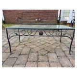 Lightweight wrought iron table with textured glass top……36-1/2 x 18 x 16 tall