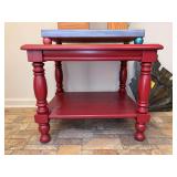 Solid wood red side table with turned legs…..OTHER CONTENTS NOT INCLUDED…..26 x 22 x 21 tall
