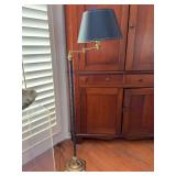 Brass base swing arm lamp with metal marble design and navy blue shade