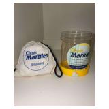 Vintage plastic jar of Classic Marbles in original carry bag