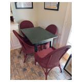 Small vintage table with (4) maroon wicker chairs…..table measures 38-1/2 x 28 x 30-1/4 tall - each chair measures 22-1/2 x 17-1/2 x 17-1/2 tall to seat (36” tall overall)…..wicker chairs have s