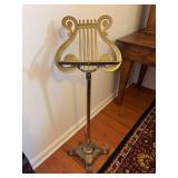 Vintage MCM ornate brass lyre-shaped music stand…..39-1/4” tall