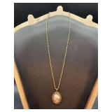 Vintage sterling encased cameo pendant on gold-tone Monet chain…..weight of cameo is 2 grams