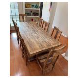 Exquisite solid wood table with seating for (8). This set has a distressed look and is in great condition….wood has a cedar look but exact match is unknown