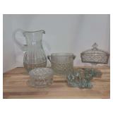 Grouping of clear glass…..pitcher, lidded pedestal candy dish, small ice bucket, frog tealight holder and lidded trinket box