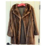 Unmarked dressy mink jacket….no size listed but would guess M/L….inside is monogrammed