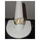 Man's 10k gold poker ring w/4-clear stones(diamond checker was to big to fit between the prongs) size 10.75 total 5.3 grams...