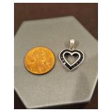 10k white gold heart pendant w/dark stones 1.4 total grams...