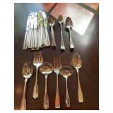 Oneida and Supreme three-piece serving utensil set plus miscellaneous spoons and knives