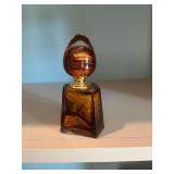 Tiger eyed Amber swirling glass perfume bottle. The top does need reattached.