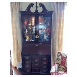 Beautiful Jasper bubble glass secretary 33” x 17” x 82”. This secretary is in one piece. Contents not included.