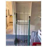 4 rod and reels, two Crappie poles and an empty rod container.. tip on one rod is broken