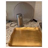 Cuisinart can opener, gold plastic tray and a mesh screen