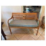 Bench Seat measuring 46“ x 23“ x 33“. Possibly white Oak. Stain on bottom of cushion