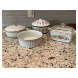 Covered Pyrex Spice of Life casserole( does have a chip on lid), two white with gold trimmed bowls and a floral porcelain hand painted covered bowl (does have nick on edge).