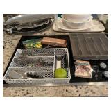 Grouping of miscellaneous utensils and covered utensil tray
