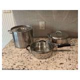 Cuisinart stainless steel 3 1/2 quart skillet(looks to be new), a large stock pot and a steamer top with lid