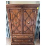 Four drawer armoire with brass pulls 40“ x 19“ x 62“
