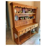 Pine hutch. The base is 68“ x 19“ x 31“.   The top piece is 68“ x 40 1/2“ contents not included