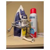 Rowena iron and can of starch