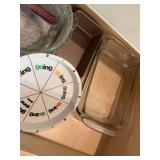 Group of bakeware; 4 pie pans, one loaf tin and two 9 x 11 glass