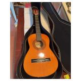 Prelude QC 24 guitar with case