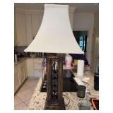 Lamp - the base is 7” x 7” and 34 inches tall does have some Knicks around base as shown