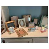 Group of frames and miscellaneous decor pieces