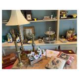 Group of miscellaneous household decor. The lamp is 34 inches tall. The candle holders are 9 1/2 inches without the candles. Lillian Vernon baby bed set and two 9 x 9” pillows.