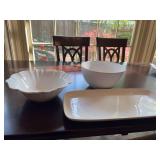 Three white serving pieces; the platter is 21 1/2“ x 10“ the round bowl is 11 inches round by 6 inches tall. The curved bowl is 12 1/2 inches wide by 4 inches tall
