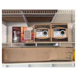 Three speakers in boxes