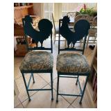 2 teal metal rooster barstools/high boy chairs 15“ x 15“ x 43“ the floor seat is 25 inches from floor. One does show some paint chipping and missing cap on left side