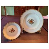 One 9 ￼inch serving bowl and one 5 1/2 inch Fitz and Floyd China. ￼ Saint Nicholas pattern.. The bowl does have some wear around edges as shown.