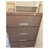Four drawer metal filing cabinet 36” x 18” x 51 1/2” bottom drawer is not closing completely