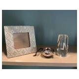 2 1/4“ x 4 3/4” inch crystal bud vase with a metal cigarette holder and a silver 7 x 7“ picture frame ￼
