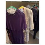 Three dress pieces the purple is a size 18, the tan is a size 16 and the Chico’s jacket is a 2