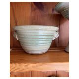 Green handled pottery bowl 7” x 4”