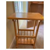 Light oak table magazine stand. Does need to be tightened a little 19” x 15” x 26 1/2”.