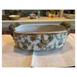 ￼ 14”x 6 1/2“ x 5“ oval Chinese porcelain planter with rooster.. looks to have had a brass ring handle at one time