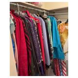 Mixed grouping of clothes and jackets looks to be 14s through extra larges and Chico’s 3