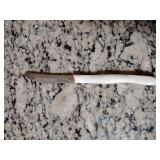 Cutco Table Knife (Model 1759W) features a Pearl White ergonomic handle and a serrated Double-D edge blade. 8 1/2" L